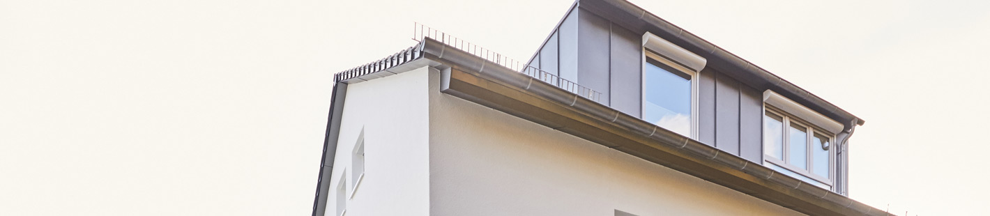 Altbausanierung: Dachgeschoss Mehrfamilienhaus nach Sanierung